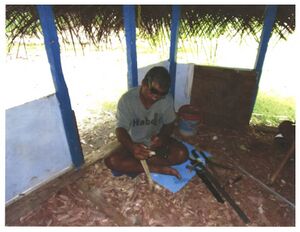 Mounting Blade onto Adze Handle Seliap Woleai Atoll Yap State Copyright Habele.jpg